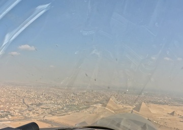 BRIGHT STAR 25: USAF F-16 Fighting Falcon, EAF Dassault Rafale fly over Pyramids