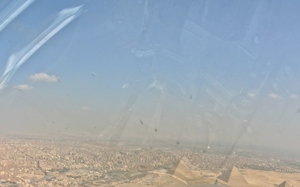 BRIGHT STAR 25: USAF F-16 Fighting Falcon, EAF Dassault Rafale fly over Pyramids