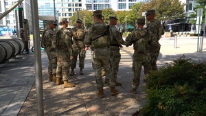 Soldiers provide a presence patrol at the Navy Yard