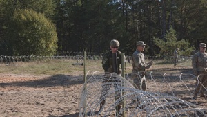 U.S. Military Police construct containment centers with their NATO allies