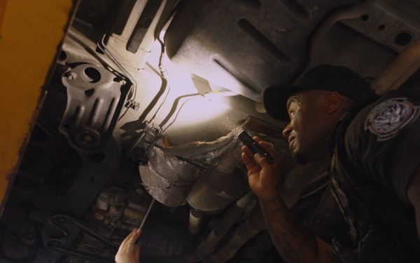 CBP Officers search a vehicle for drugs and contraband