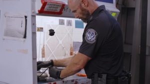 CBP Officers find bundles hidden in a vehicle and run a test to identify the substance