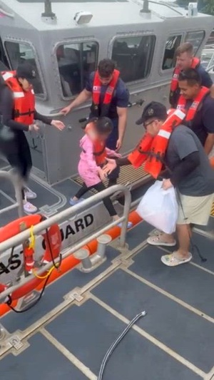 U.S. Coast Guard, Guam Fire Department rescue 45 people from boat off Agat, Guam