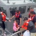 U.S. Coast Guard, Guam Fire Department rescue 45 people from boat off Agat, Guam