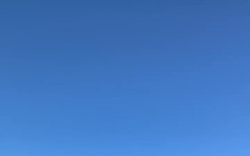 Coast Guard Small Boat Crew Watches Helicopter Fly Over