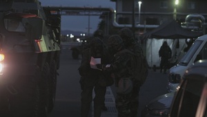 U.S. Marines and JGSDF members respond to a simulated CBRN attack during exercise Active Shield 26