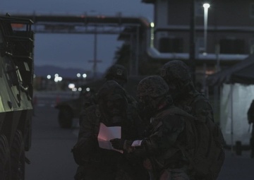 U.S. Marines and JGSDF members respond to a simulated CBRN attack during exercise Active Shield 26