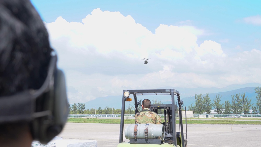 Joint Task Force-Bravo Load Shelter Supplies into CH-47 Chinook