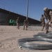 JTF-SB Marines prep concertina wire for installation (B-Roll)