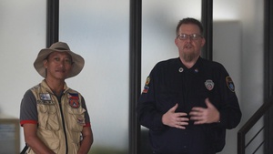 Philippine Disaster Relief Specialists Conduct Interview During Relief Operations Supported by US Military in Virac, Philippines