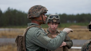 U.S. Marines from across II MEF rehearse setting up a forward arming and refueling point while forward deployed