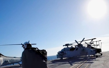 AN MH-60S Sea Hawk Performs Flight Deck Operations aboard USS George H.W. Bush
