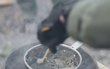 U.S. Marine explosive ordnance disposal technicians execute an experimental demolition range