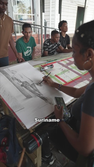 Sgt. Katie Cramer of the 147th Army Band, South Dakota Army National Guard, talks about her experience conducting a cultural engagement with a local art academy in Paramaribo