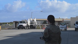 Total Force Airmen Execute Integrated Combat Turn for F-22 Raptors