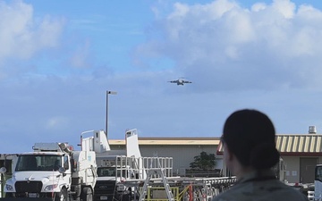 Total Force Airmen Execute Integrated Combat Turn for F-22 Raptors