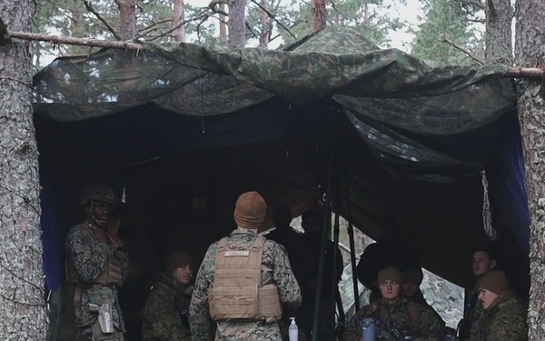 U.S. Navy chaplain prays with Marines and Sailors during European deployment