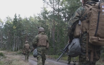 U.S. Marines establish a secured area during a bilateral exercise while deployed in the Baltic sea