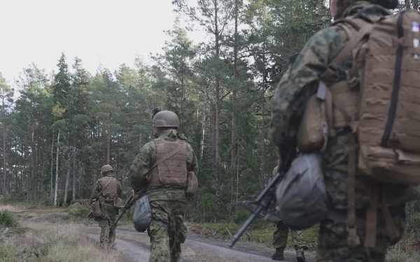 U.S. Marines establish a secured area during a bilateral exercise while deployed in the Baltic sea