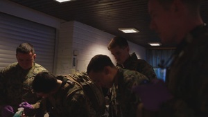 U.S. Sailors use Battlefield Assisted Trauma Documentation Kit for simulated casualty during European deployment
