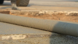 B-roll of 131st Bomb Wing civil engineering Airmen repairing airfield concrete during Exercise Northern Strike 25-2