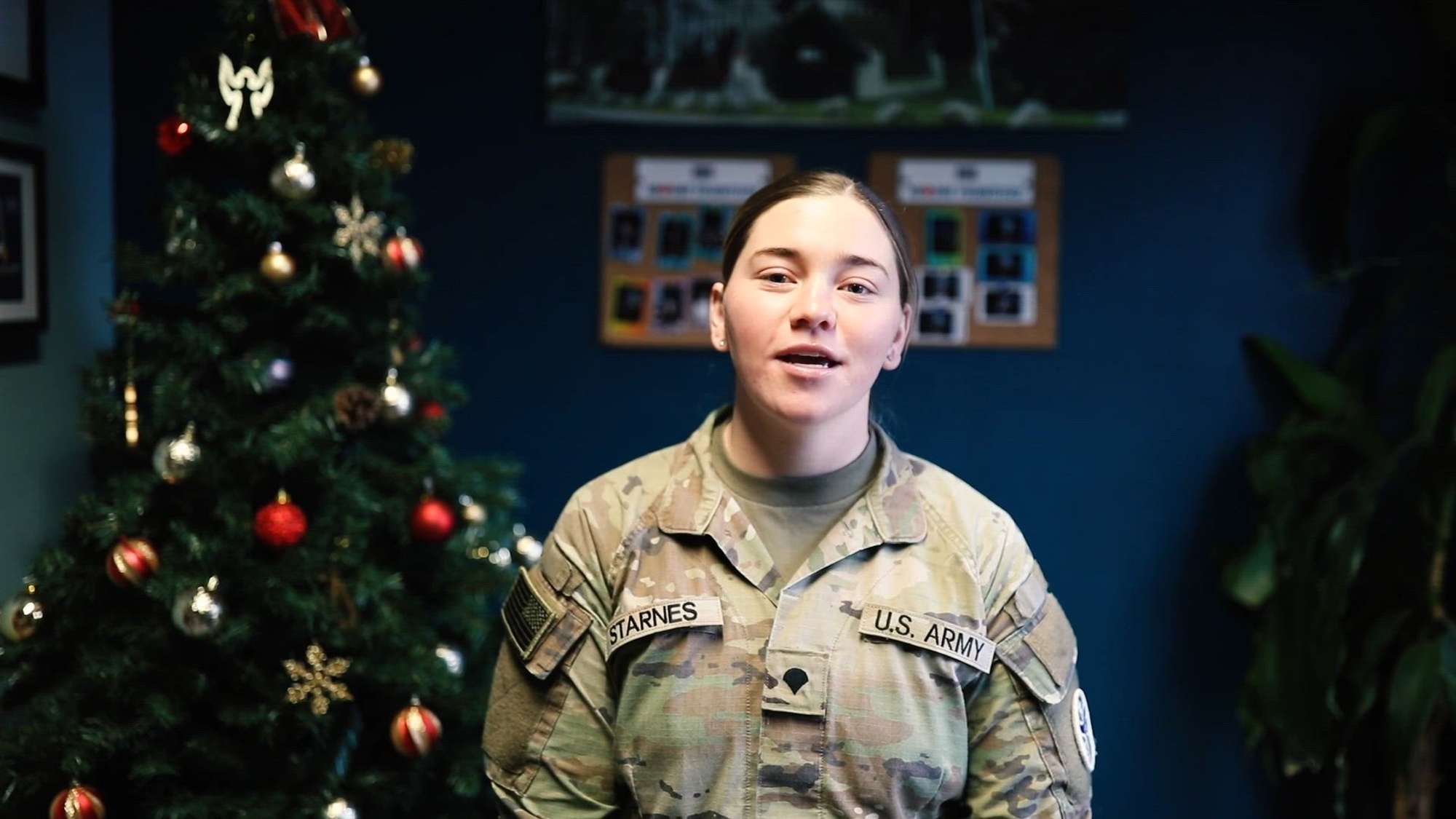 U.S. Army Spc. Taylor Starnes of Bean Station, Tennessee gives a holiday shout-out to family and friends while deployed to Grafenwoehr, Germany.