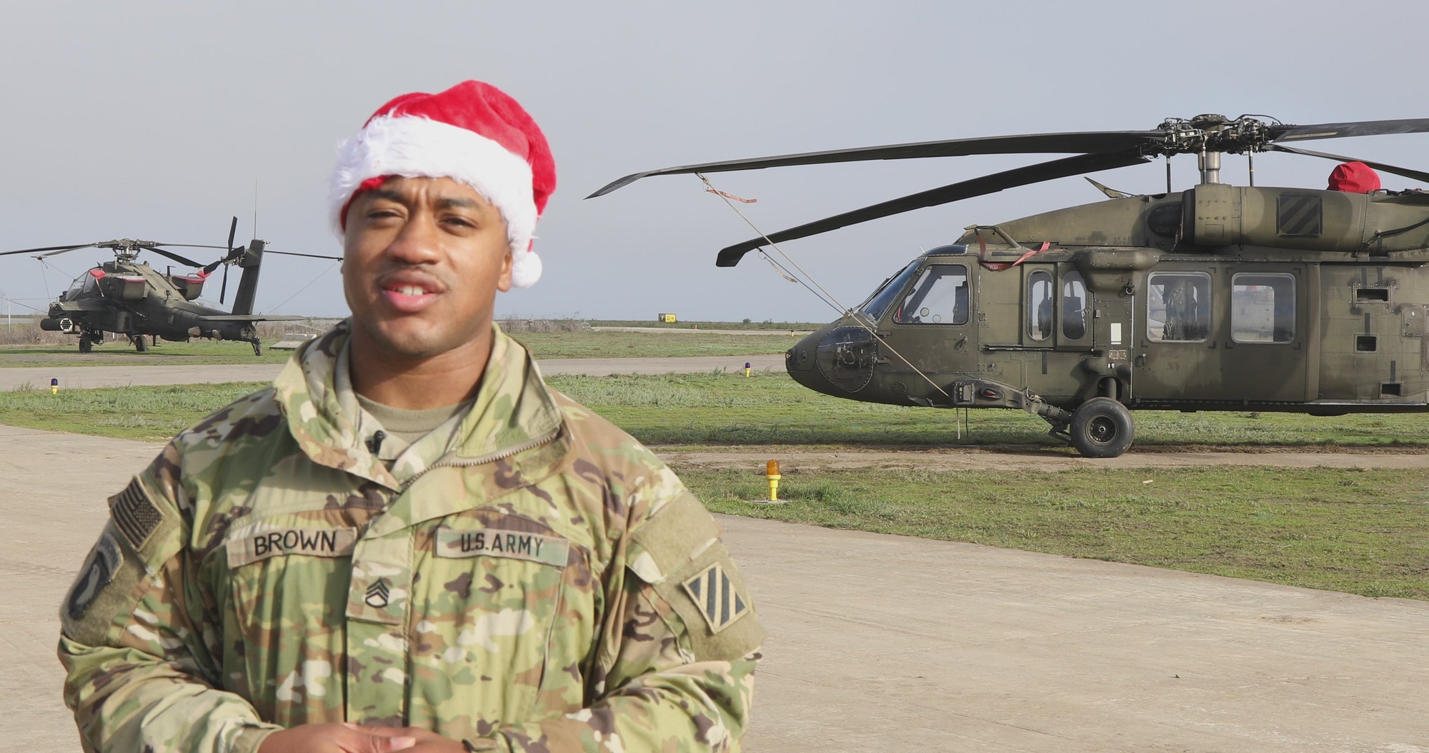 U.S. Army Staff Sgt. Malcolm Brown, assigned to Delta Company, 4th Assault Helicopter Battalion, 3rd Aviation Brigade, 3rd Infantry Division, is from Atlanta, GA and is wishing his family a Happy Holidays.