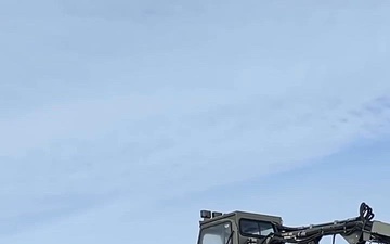 Airmen De-ice C-130 aircraft