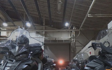 U.S. Marines with 4th Law Enforcement Battalion load and offload snowmobiles and equipment aboard a C-130 aircraft during a Toys for Tots delivery operation in Kotzebue, Alaska, Dec. 4, 2025.