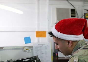 U.S. Soldiers assigned to Kosovo Force Regional Command–East wish Merry Christmas and Happy Holidays greetings from Kosovo