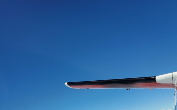 U.S. Coast Guard Aviation Training Center Mobile aircrews fly over the Auburn Vs. Mercer football game