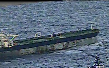 USCGC Munro shadows M/V Bella 1