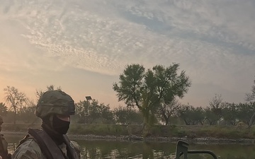 U.S. Army soldiers operate M30 Bridge Erection Boats in the Rio Grande (B-Roll)