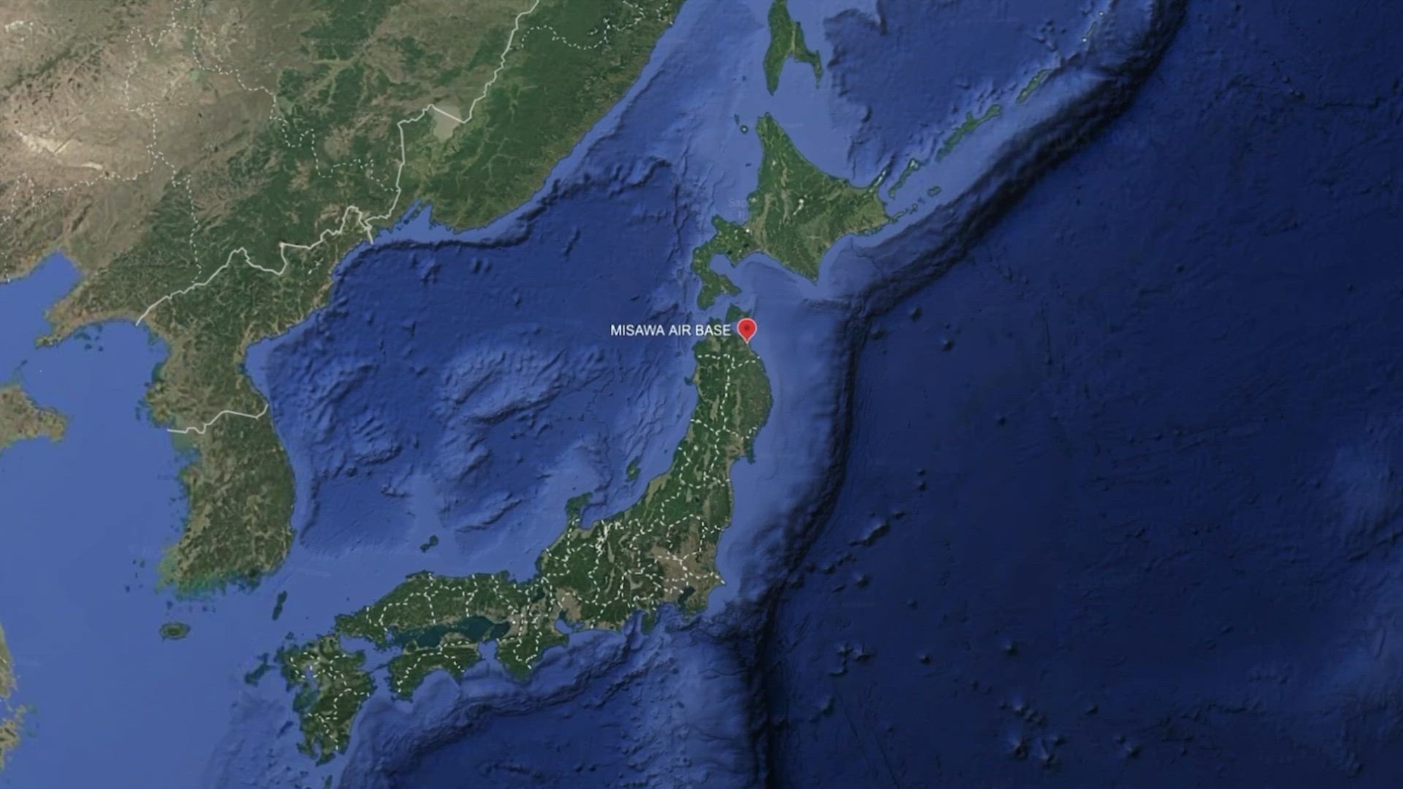 Topographical map shows Japanese islands and surrounding water.