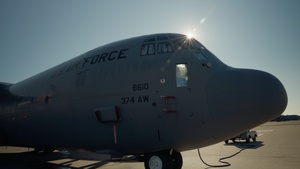 Loadmasters prepare a C-130J for NYJIP26