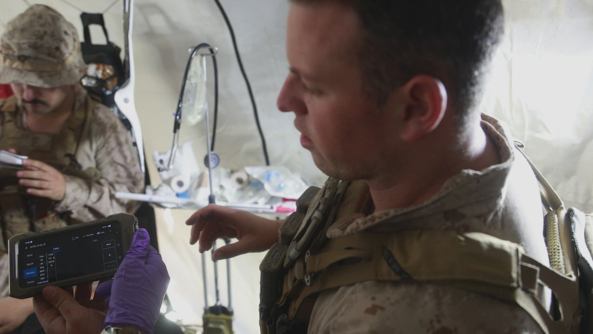 U.S. Marines and Sailors from across I Marine Expeditionary Force experiment alongside the Marine Corps Warfighting Laboratory (MCWL) with the Battlefield Assisted Trauma Distributed Observation Kit-Joint (BATDOK-J), a mobile medical documentation tool that enables real-time collection and sharing of patient vital signs and treatment data from the point of injury to enhance continuity of care across the joint force, during Exercise Steel Knight 25 at Marine Corps Base Camp Pendleton, California, Dec. 11, 2025. Steel Knight is an annual exercise that strengthens the Navy-Marine Corps team's ability to respond forward, integrate across domains, and sustain Marine Air-Ground Task Force readiness. (U.S. Marine Corps video by Cpl. Michael Bartman)

The video contains music from a USMC enterprise licensed asset from Adobe Stock: Ambient Dreamy Atmosphere performed by FineTune Music/stock.adobe.com