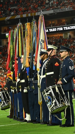 Coast Guard Air Station Miami conducts a military flyover for College Football National Championship game