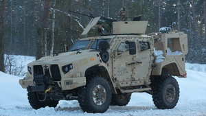 U.S. Soldiers train with M2A3 Bradleys during platoon STX in Poland