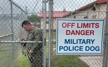 Drug Detection Dog and Handler Maintain Security from Military's Largest Joint Kennel