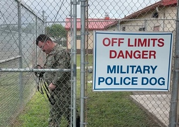Drug Detection Dog and Handler Maintain Security from Military's Largest Joint Kennel