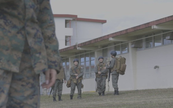 Japan Self-Defense Force cadets provide combat casualty care during a TCCC course