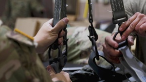 Spartan support battalion prepares equipment for air drop