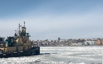 The Coast Guard Cutter Hawser successfully broke ice and freed the NYPD Harbor David after the vessel became beset.