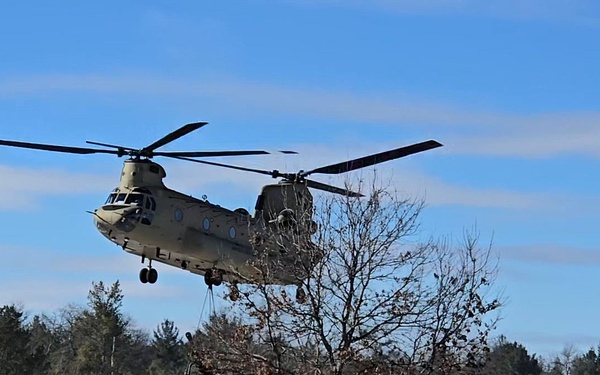120th Field Artillery Soldiers conduct winter sling-load ops with Black Hawk, Chinook helicopters, Part 10