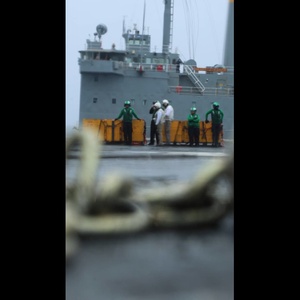 Abraham Lincoln conducts a replenishment-at-sea with Henry J. Kaiser