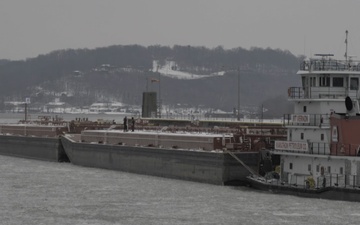 Cannelton personnel ensure safe navigation during freezing weather b-roll 4k
