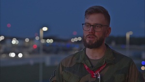 Royal Norwegian Air Force Service members discuss Exercise Point Blank