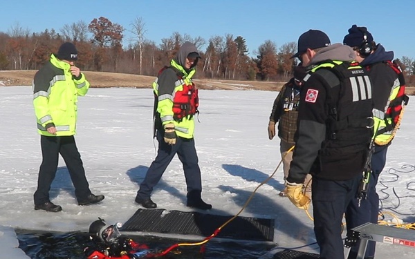 Fort McCoy DES Fire Department dive team holds 2026 ice rescue training at frozen lake at Fort McCoy, Part 2