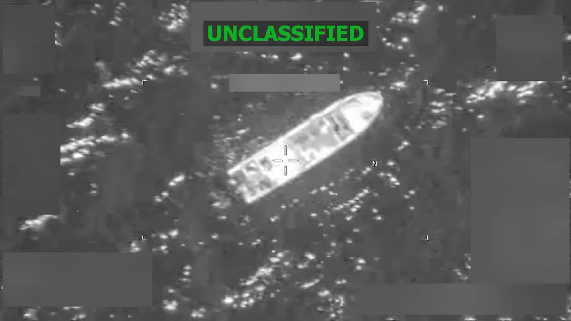 Black and white overhead video footage of a boat strike.