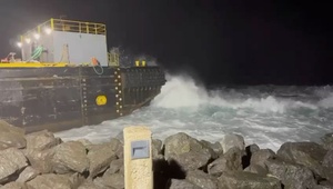 Unified Command, marine salvors refloat grounded barge just off San Juan Harbor port entrance